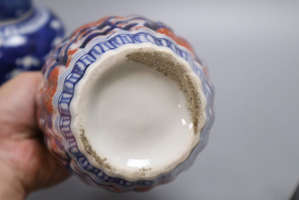 A blue and white Chinese dragon jar, an Imari jar and a blue and white lidded Prunus jar, tallest 17.5cm